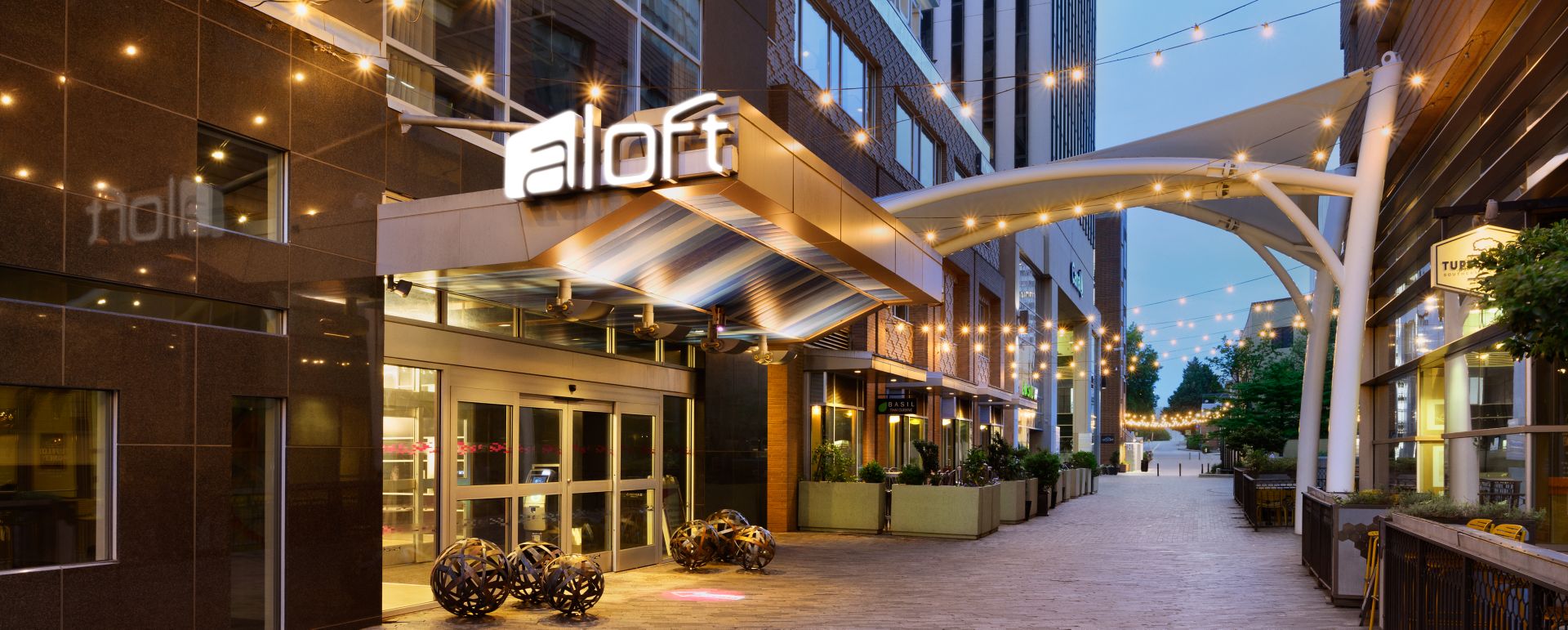Decorative Image the Aloft Hotel Exterior in Greenville, SC